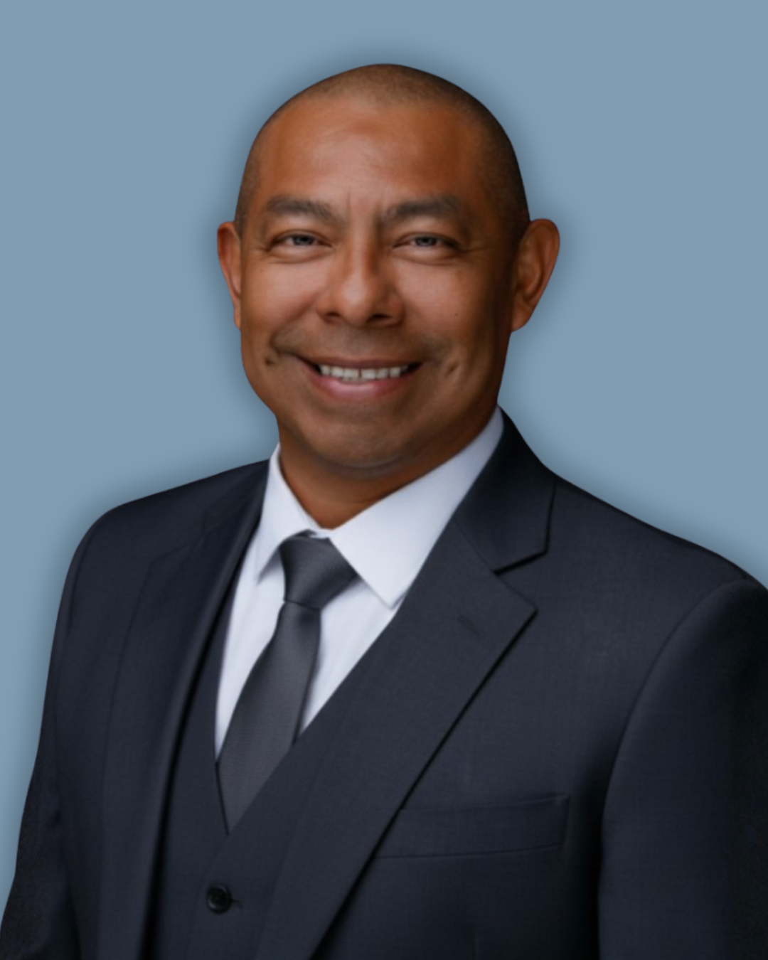 Professional headshot of Brito Emiliano, a multilingual San Diego realtor helping military personnel relocate effortlessly.