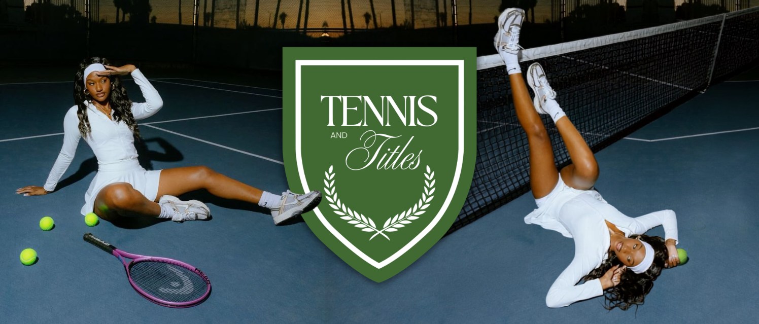 A wide lifestyle fashion banner showing two athletic models posing in white tennis sportswear on a blue hard court at twilight with a tennis racket and green tennis balls framing a central green Tennis and Titles shield logo